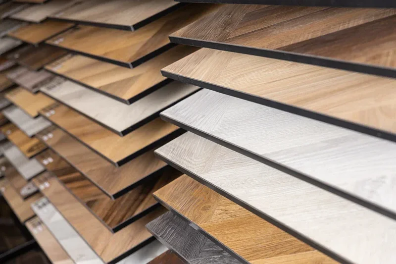 Curated laminate timber samples displayed for an in-home consultation